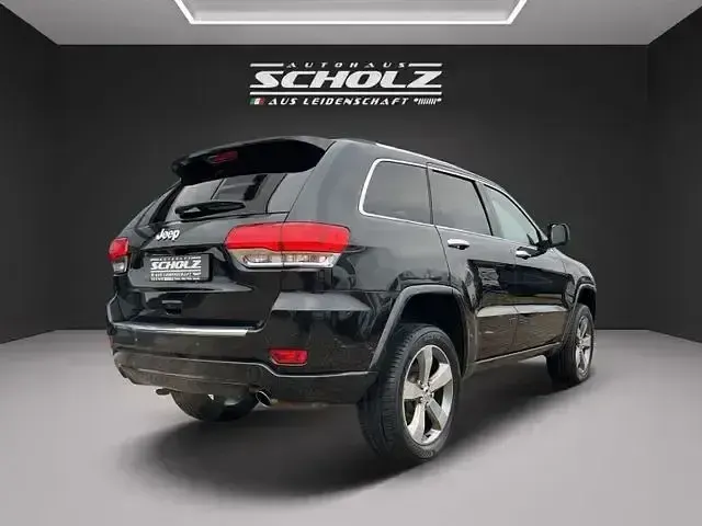 Gebraucht Jeep Grand Cherokee 250 PS (183 kW) 2014 Brilliant black (perleffekt) SUV