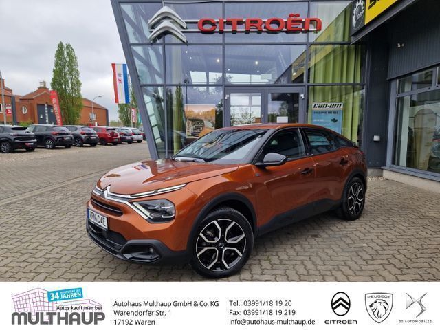 Orange Gebraucht 2021 Citroën e-C4 Feel Limousine | 16.440 € (Superpreis) - Bild 1/4