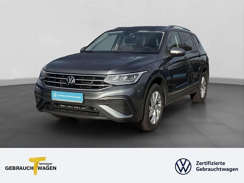 Grau Gebraucht 2024 VW Tiguan Allspace Life SUV | 33.420 € (Superpreis) - Bild 1/4