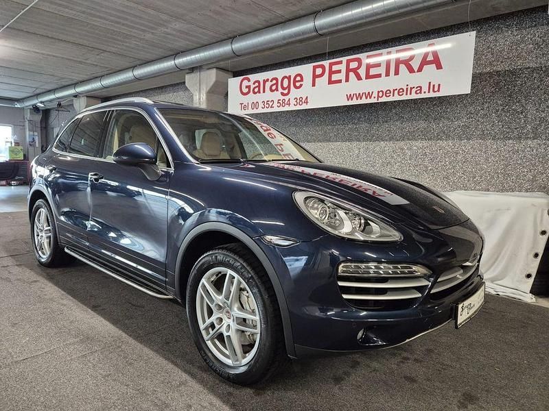 Blau Gebraucht 2010 Porsche Cayenne S E-Hybrid SUV | 22.900 € - Bild 1/4