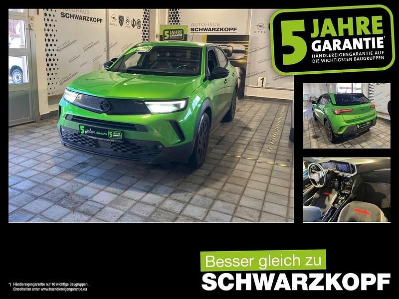Grün Gebraucht 2023 Opel Mokka-e SUV | 18.880 € (Fairer Preis) - Bild 1/4