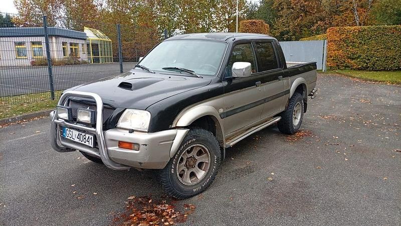 Schwarz Gebraucht 2004 Mitsubishi L200 Abholung | 3.500 € - Bild 1/4