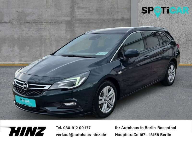 Grün Gebraucht 2016 Opel Astra Dynamic Kombi | 12.590 € (Fairer Preis) - Bild 1/4