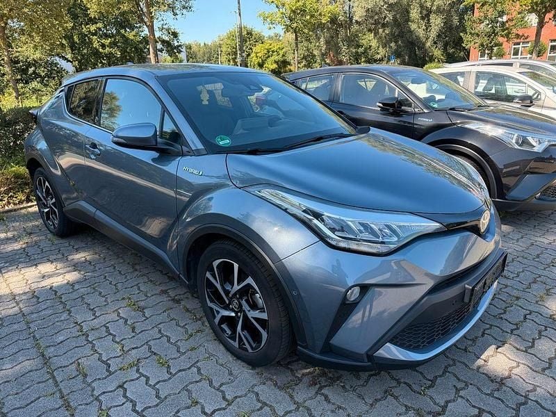 Grau Gebraucht 2021 Toyota C-HR Team SUV | 19.590 € (Guter Preis) - Bild 1/4