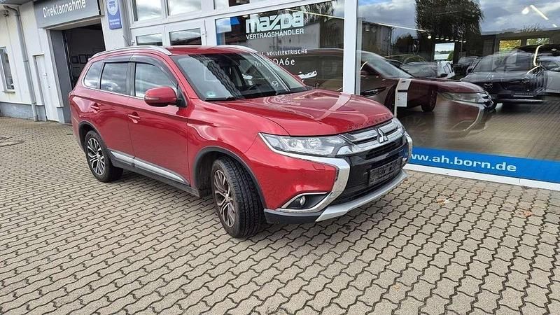 Karminrot (m) Gebraucht 2016 Mitsubishi Outlander SUV | 13.990 € (Teuer) - Bild 1/4