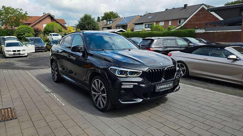 Saphirschwarz Gebraucht 2020 BMW X6 M SUV | 74.990 € (Teuer) - Bild 1/4