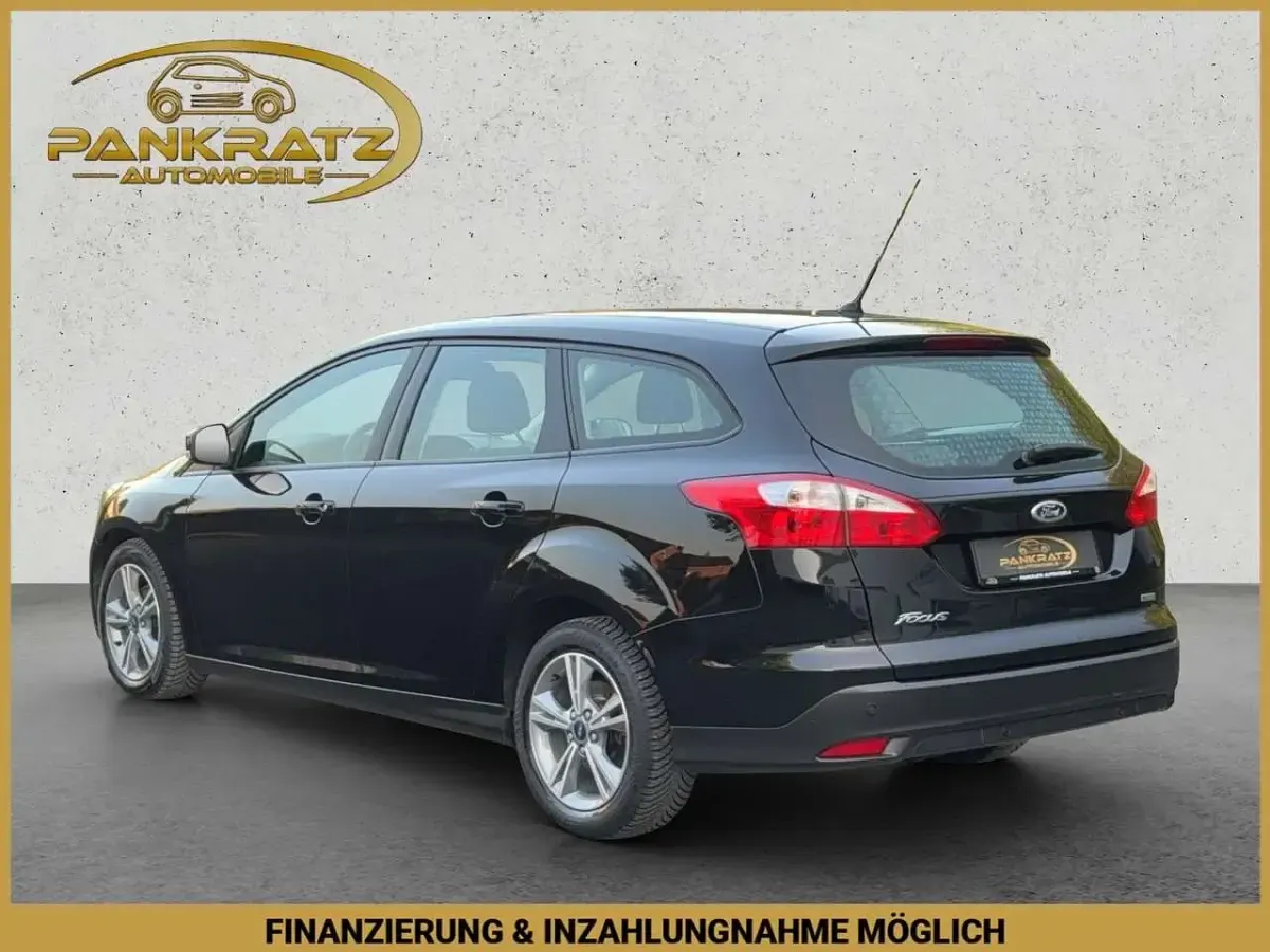 Używany Ford Focus 101 KM (74 kW) 2014 Czarny Kombi