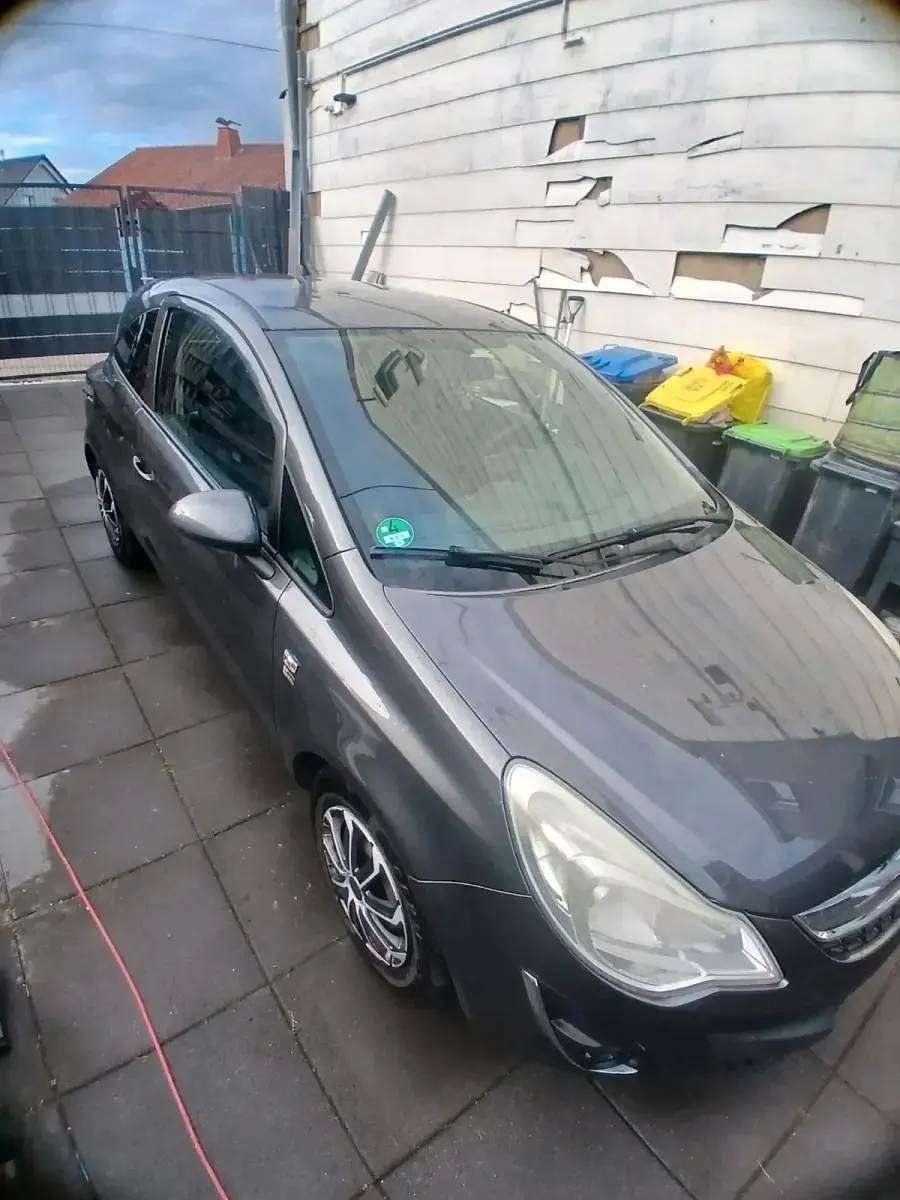 Gebraucht Opel Corsa 75 PS (55 kW) 2012 Grau Kleinwagen