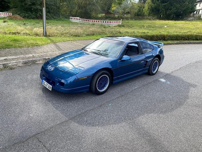 Blau Gebraucht 1988 Pontiac Fiero Coupé | 7.990 € - Bild 1/4