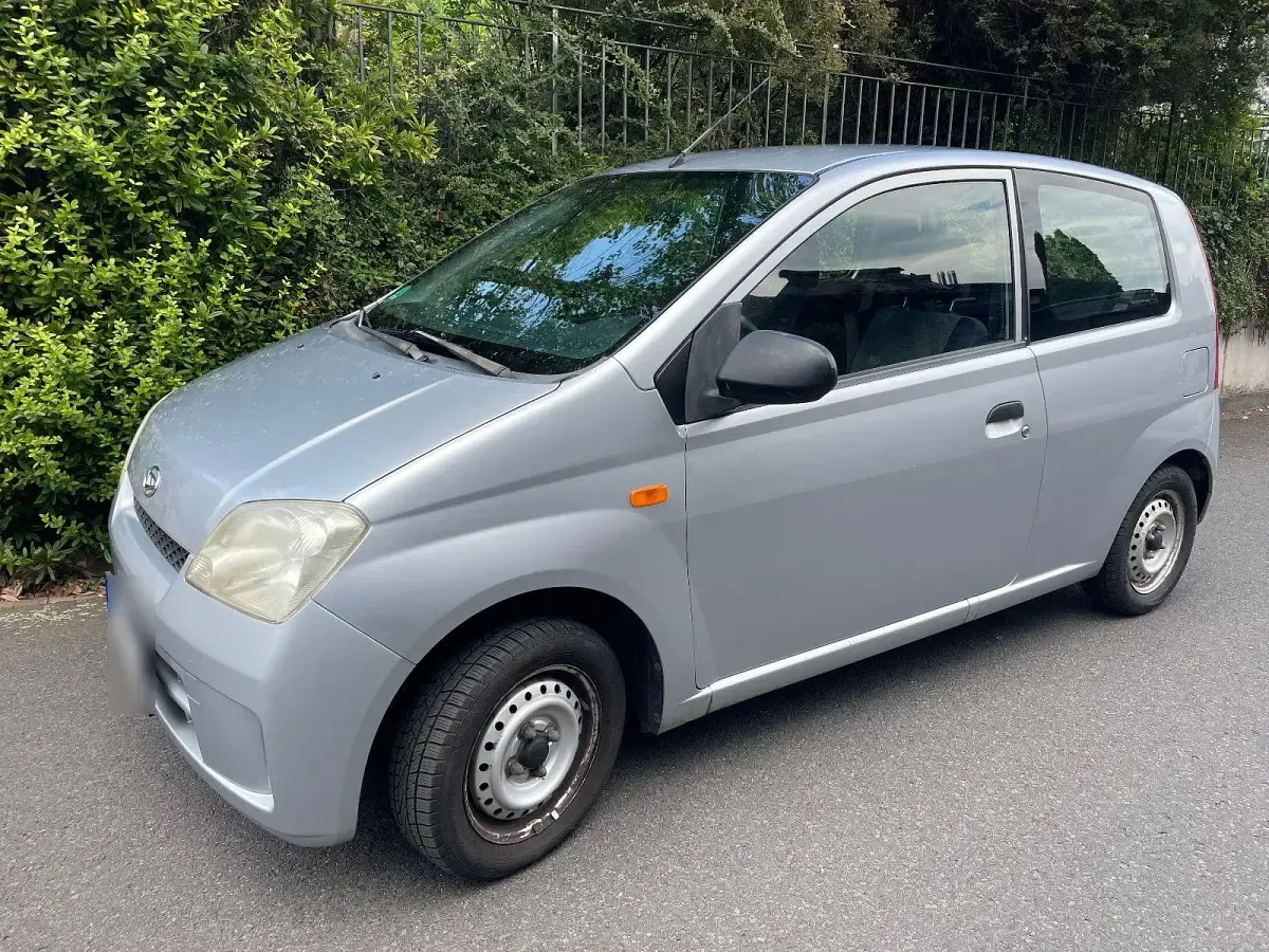Gebraucht Daihatsu Cuore Plus 58 PS (42 kW) 2004 Grau Kleinwagen