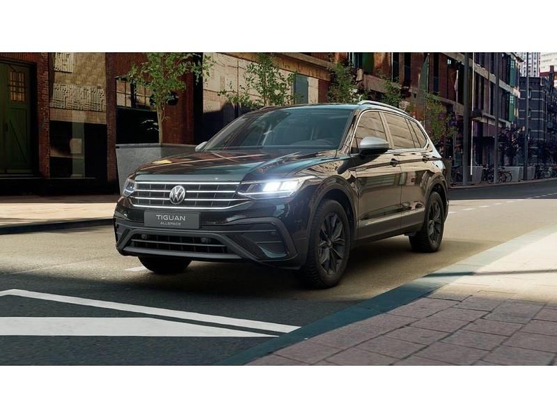 Schwarz Gebraucht 2024 VW Tiguan Allspace Move SUV | 43.425 € (Teuer) - Bild 1/4