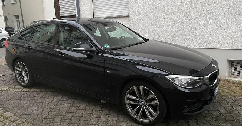 Schwarz Gebraucht 2013 BMW 320 Gran Turismo Sport Line Limousine | 11.100 € (Guter Preis) - Bild 1/4