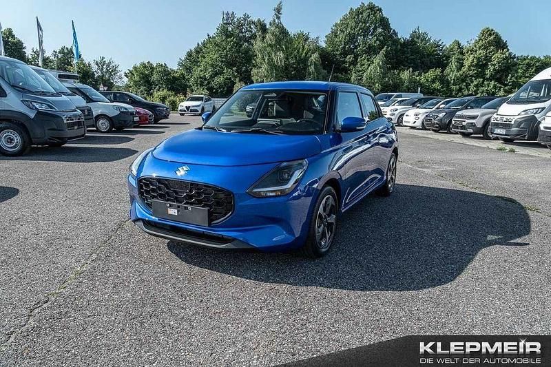 Blau Neu 2025 Suzuki Swift Comfort+ Limousine | 20.990 € - Bild 1/4