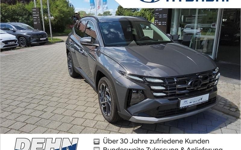 Grau Gebraucht 2024 Hyundai Tucson Prime SUV | 42.975 € (Etwas zu teuer) - Bild 1/3