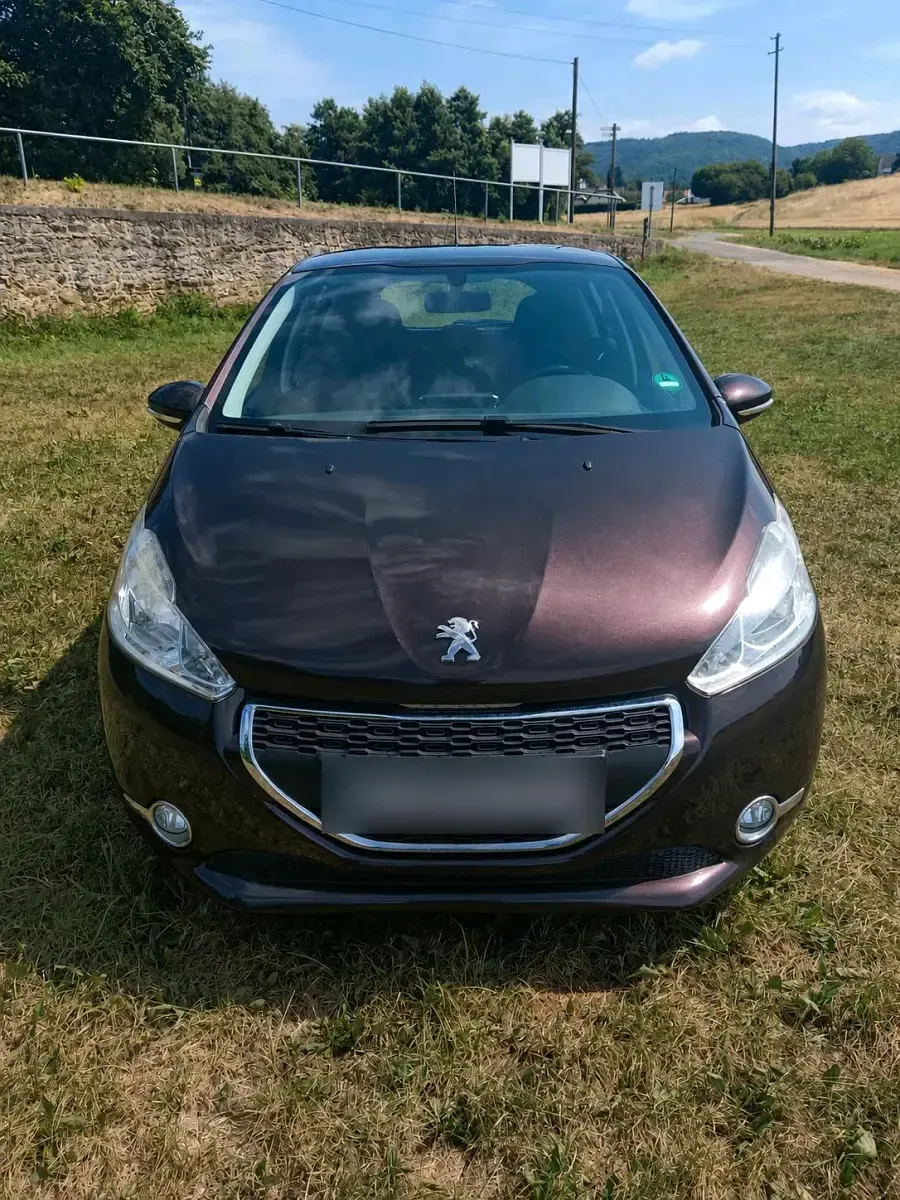 Gebraucht Peugeot 208 Style 82 PS (60 kW) 2013 Braun Kleinwagen