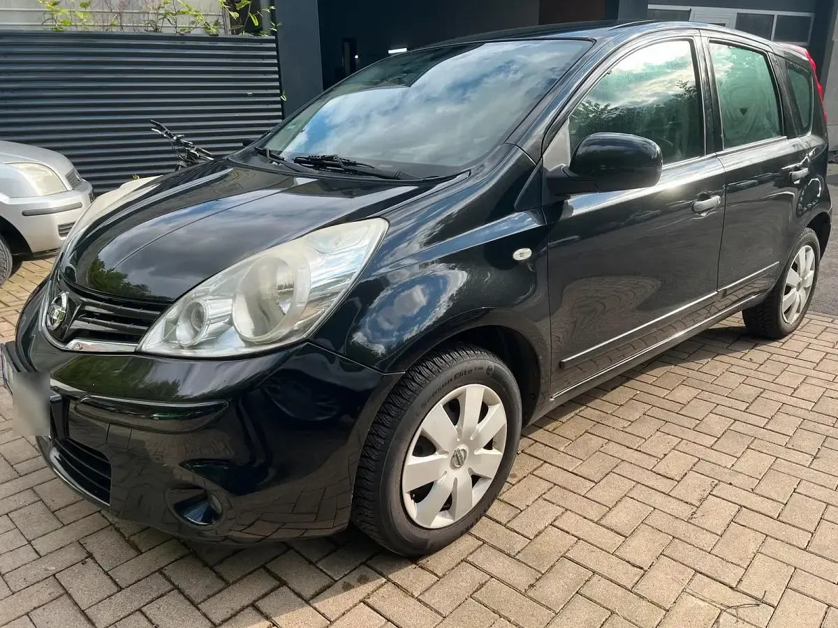 Gebraucht Nissan Note 65 PS (47 kW) 2011 Schwarz Kleinwagen