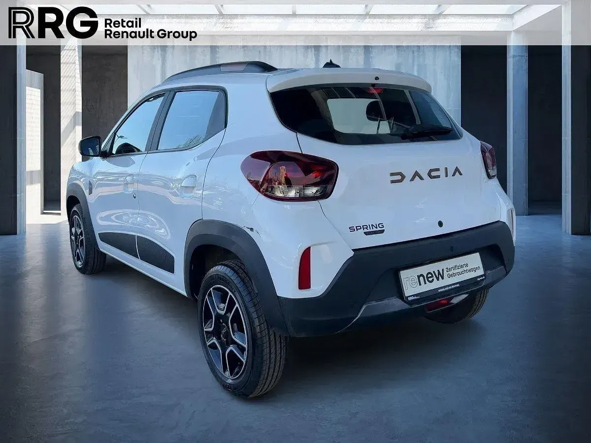 Gebraucht Dacia Spring Extreme 19 kW (26 PS) 2024 Polarweiss Kleinwagen