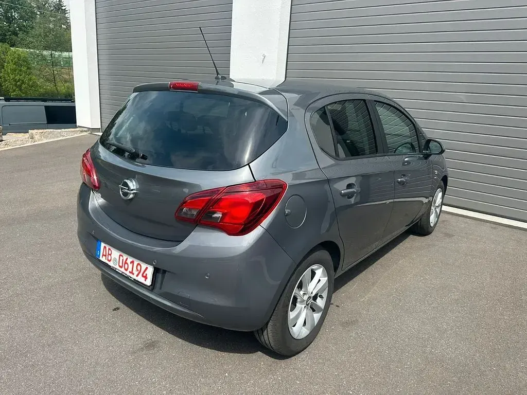 Używany Opel Corsa drive 90 KM (66 kW) 2015 Szary Hatchback