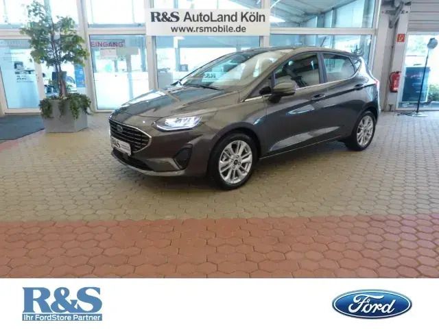 Magneticgrau (metallic) Gebraucht 2023 Ford Fiesta Titanium Kleinwagen | 19.500 € (Fairer Preis) - Bild 1/4