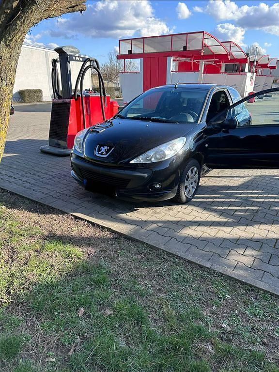 Gebraucht Peugeot 206 60 PS (44 kW) 2011 Schwarz Limousine