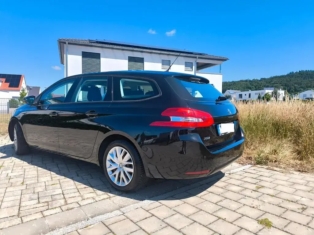 Gebraucht Peugeot 308 SW Allure 116 PS (85 kW) 2014 Schwarz Kombi