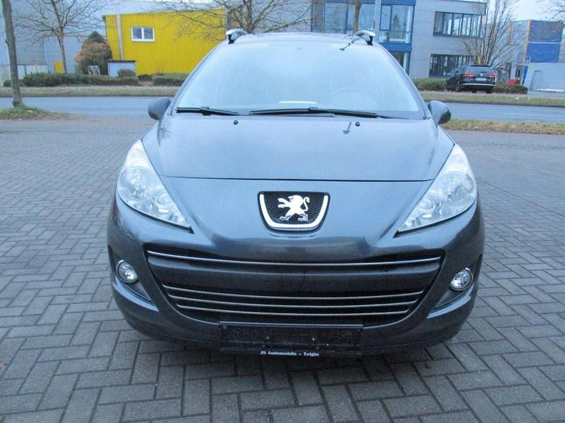 Grau Gebraucht 2011 Peugeot 207 Premium Kombi | 2.950 € (Fairer Preis) - Bild 1/4