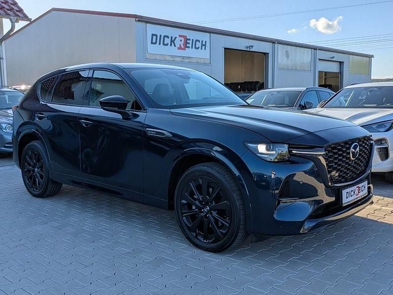 Deep crystal blue Gebraucht 2025 Mazda CX-60 Homura-Line SUV | 44.950 € (Superpreis) - Bild 1/4