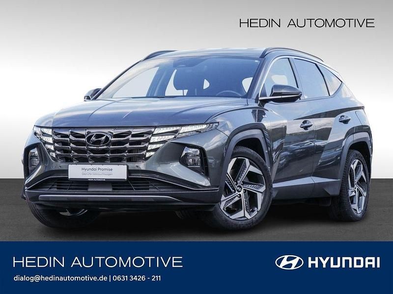 Amazon grey / met Gebraucht 2021 Hyundai Tucson Prime SUV | 26.978 € (Fairer Preis) - Bild 1/4