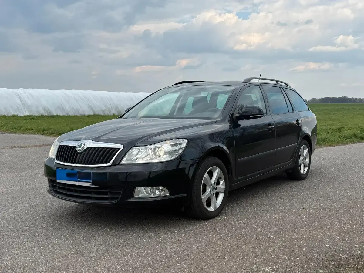 Usata Skoda Octavia 110 CV (80 kW) 2012 Nero Station wagon