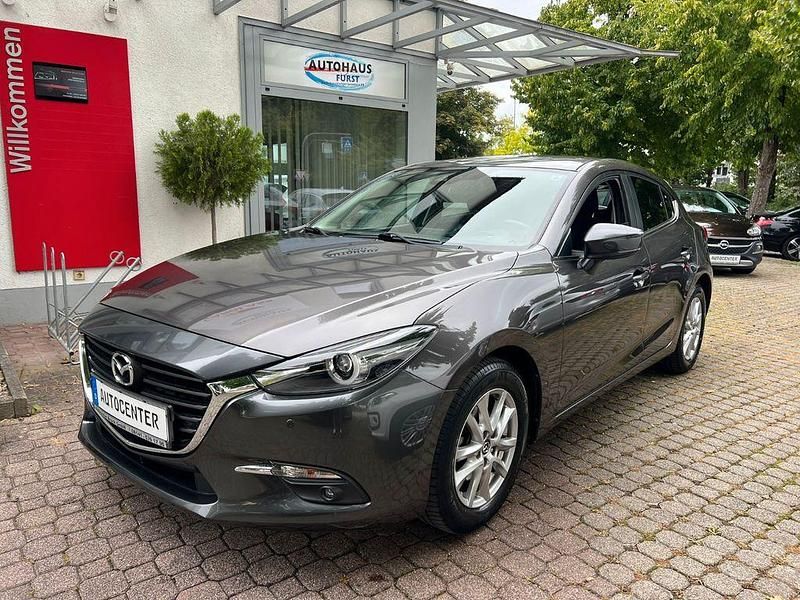Grau Gebraucht 2019 Mazda 3 Exclusive-Line Limousine | 16.800 € (Superpreis) - Bild 1/4