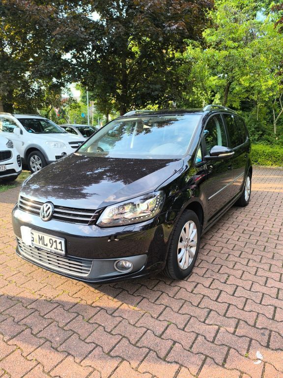 Schwarz Gebraucht 2012 VW Touran Highline Van / Kleinbus | 11.800 € (Etwas zu teuer) - Bild 1/4