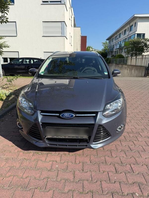 Grau Gebraucht 2014 Ford Focus Business Edition Kombi | 5.900 € (Guter Preis) - Bild 1/4