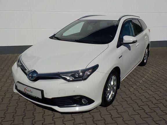 Schneeweiß Gebraucht 2016 Toyota Auris Hybrid Plus | 13.490 € (Fairer Preis) - Bild 1/4