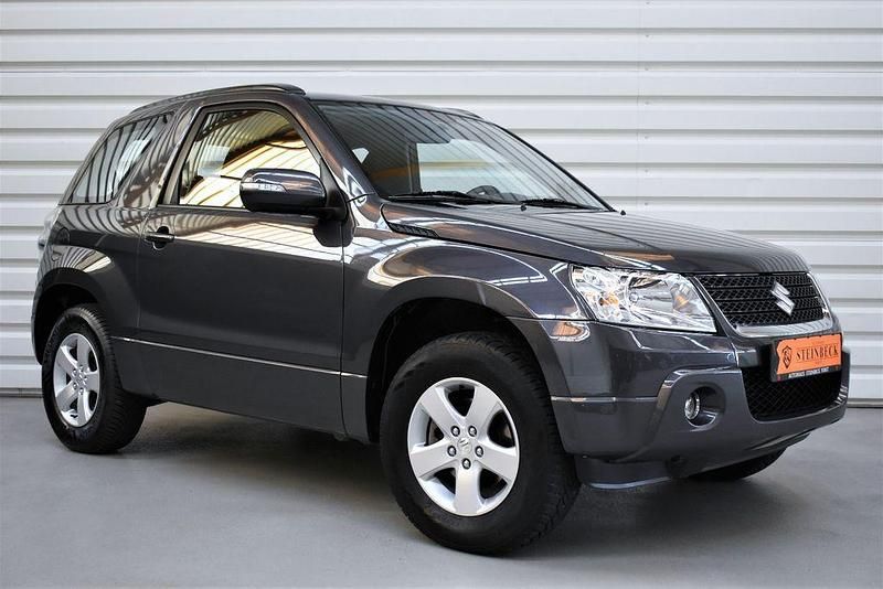 Grau Gebraucht 2013 Suzuki Grand Vitara Club SUV | 18.990 € (Teuer) - Bild 1/4