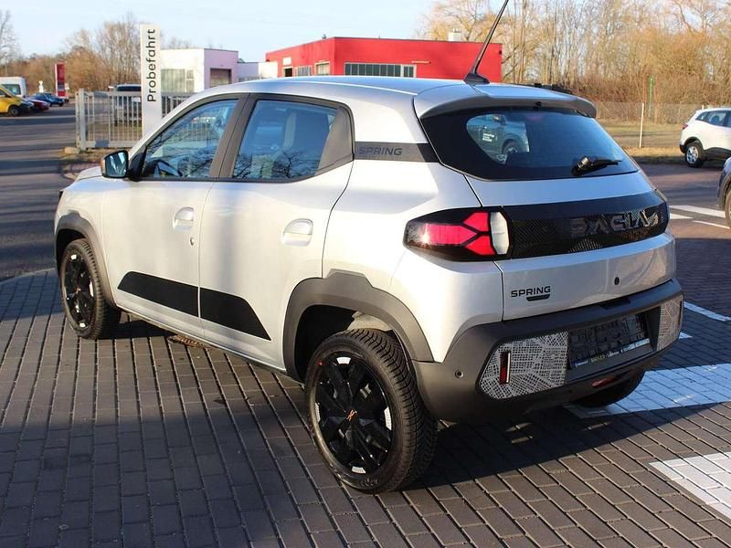 Gebraucht Dacia Spring Extreme 47 kW (65 PS) 2024 Diamantsilbergrau Kleinwagen