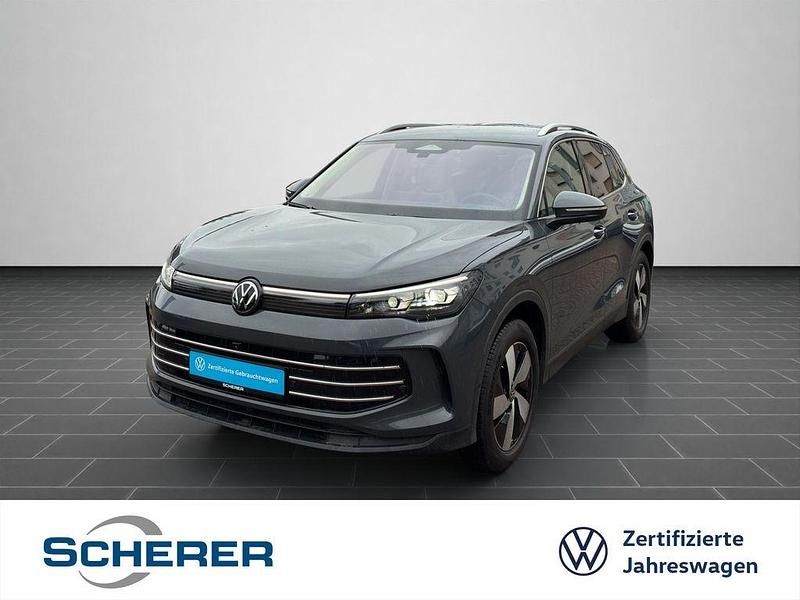 Delfingrau metallic (metallic) Gebraucht 2024 VW Tiguan Elegance SUV | 38.200 € (Fairer Preis) - Bild 1/4