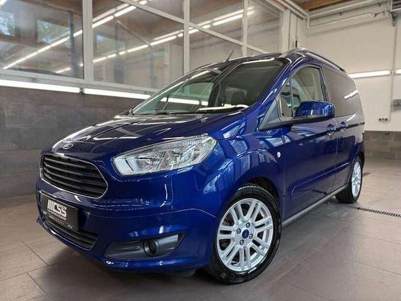 Blau Gebraucht 2017 Ford Tourneo Courier Titanium Van / Kleinbus | 13.599 € (Fairer Preis) - Bild 1/4