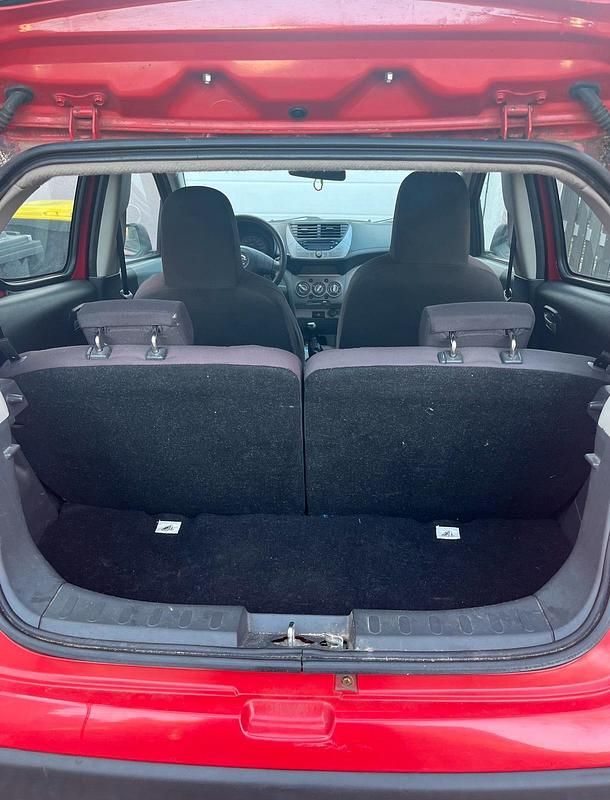 Gebraucht Nissan Pixo 68 PS (50 kW) 2009 Rot Kleinwagen