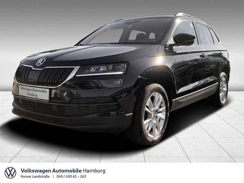Blackmagic perleffekt (metallic) Gebraucht 2021 Skoda Karoq Style SUV | 22.750 € (Guter Preis) - Bild 1/4