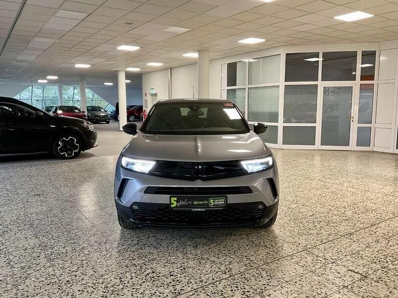 Gebraucht Opel Mokka GS Line 101 PS (74 kW) 2023 Kontrast grau/quarz silber (metallic) SUV