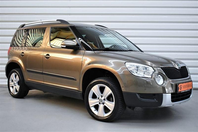 Braun Gebraucht 2011 Skoda Yeti Experience SUV | 17.990 € - Bild 1/4