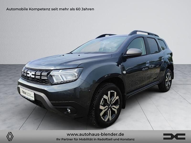 Kometengrau Gebraucht 2023 Dacia Duster Journey SUV | 21.690 € (Guter Preis) - Bild 1/4