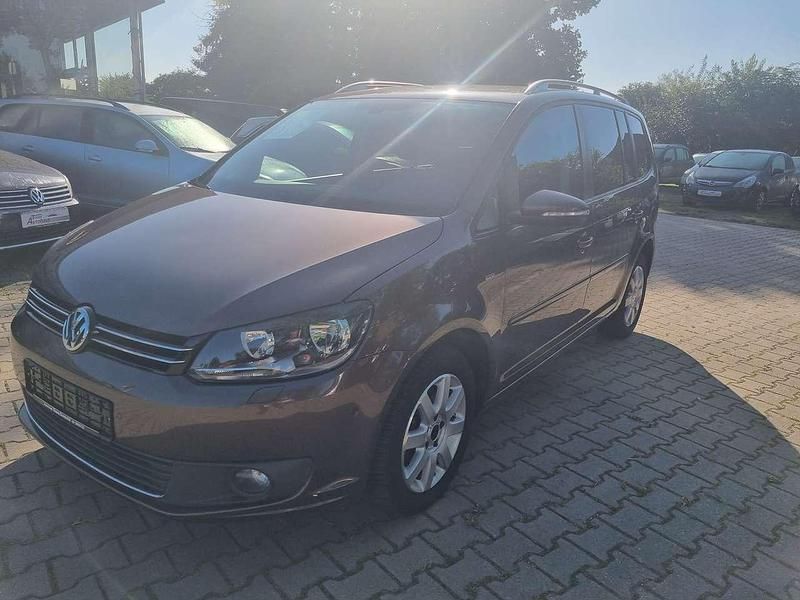 Braun Gebraucht 2013 VW Touran Life Van / Kleinbus | 8.350 € (Fairer Preis) - Bild 1/4