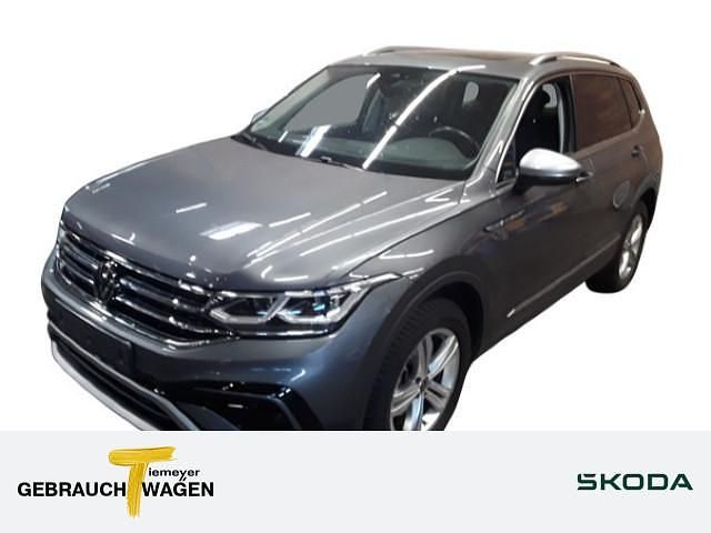 Grau Gebraucht 2024 VW Tiguan Allspace Elegance SUV | 40.790 € (Guter Preis) - Bild 1/4