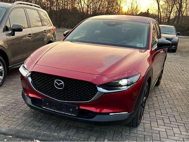 Soul red crystal m Gebraucht 2024 Mazda CX-3 Homura-Line SUV | 24.300 € (Fairer Preis) - Bild 1/4