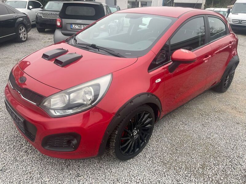Gebraucht Kia Rio Edition 7 109 PS (80 kW) 2013 (beg) signal red (bordeaux) (metallic) Limousine
