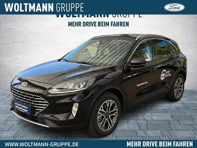 Obsidianschwarz metallic Gebraucht 2021 Ford Kuga Titanium SUV | 23.450 € (Teuer) - Bild 1/4