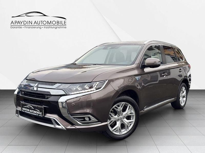 Greyish brown Gebraucht 2019 Mitsubishi Outlander P-HEV Plus SUV | 21.900 € (Guter Preis) - Bild 1/4