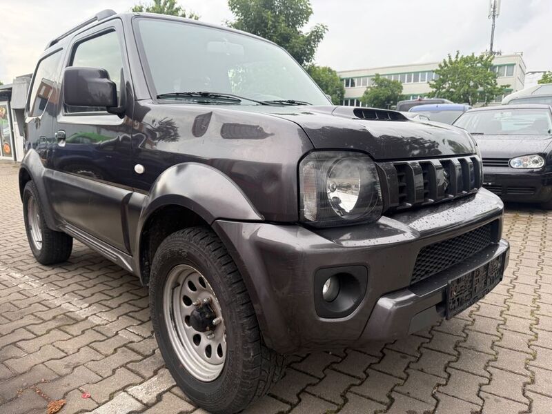 Schwarz Gebraucht 2013 Suzuki Jimny SUV | 6.999 € (Superpreis) - Bild 1/4