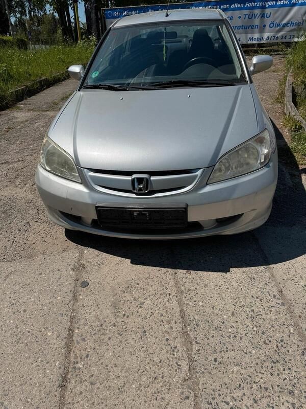 Grau Gebraucht 2004 Honda Civic Hybrid Limousine | 1.500 € - Bild 1/4